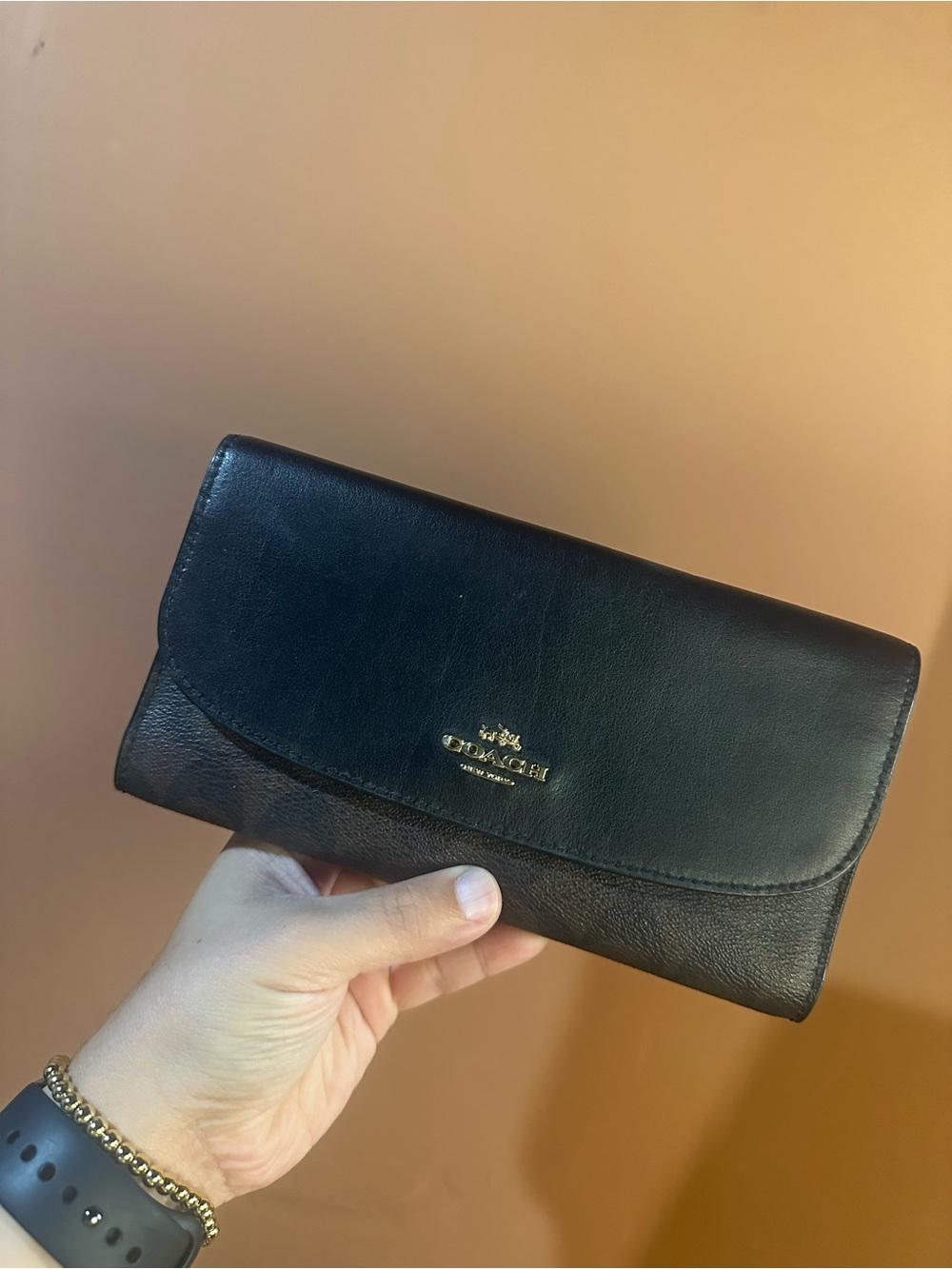 Coach Black Leather Flap Wallet with Gold Logo